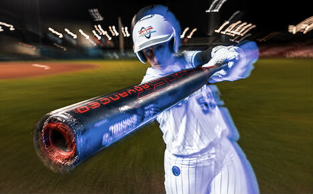 2024 Easton Ghost Advanced Fastpitch Bat: Player making contact with the bat.